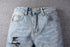 Calça Jeans com Detalhes Únicos - O Retalho