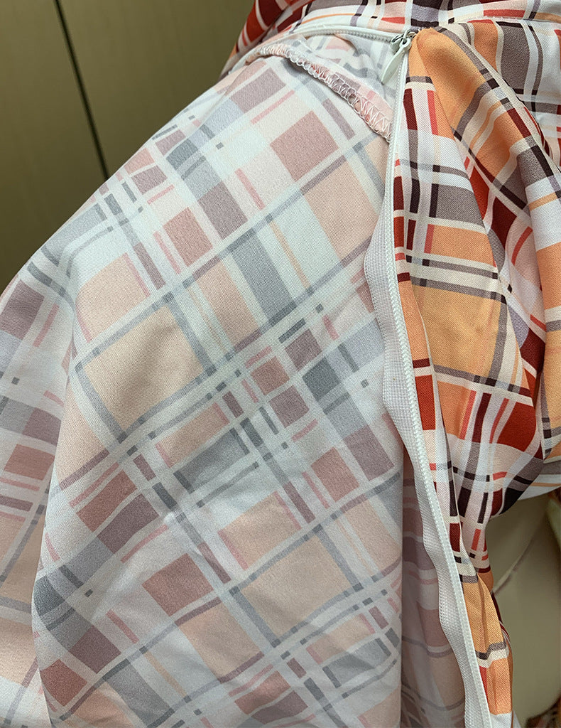 Macacão feminino estampado xadrez de mangas longas. - O Retalho
