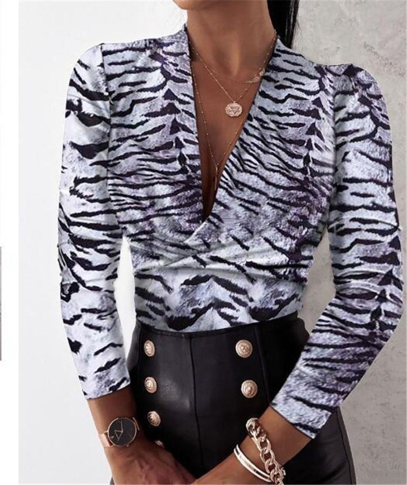 Blusa de manga comprida com decote em V com estampa - O Retalho