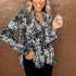 Blusa casual solta com decote em V de manga comprida com estampa - O Retalho