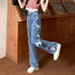 Calça Jeans Reta Solta com Laço na Cintura Alta - O Retalho