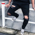 Jeans Masculino High Street Style Rasgado Preto na Moda Urbana - O Retalho