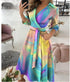 Vestido estampado com mangas compridas e decote em V. - O Retalho