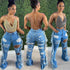 Calças Jeans rasgadas - O Retalho