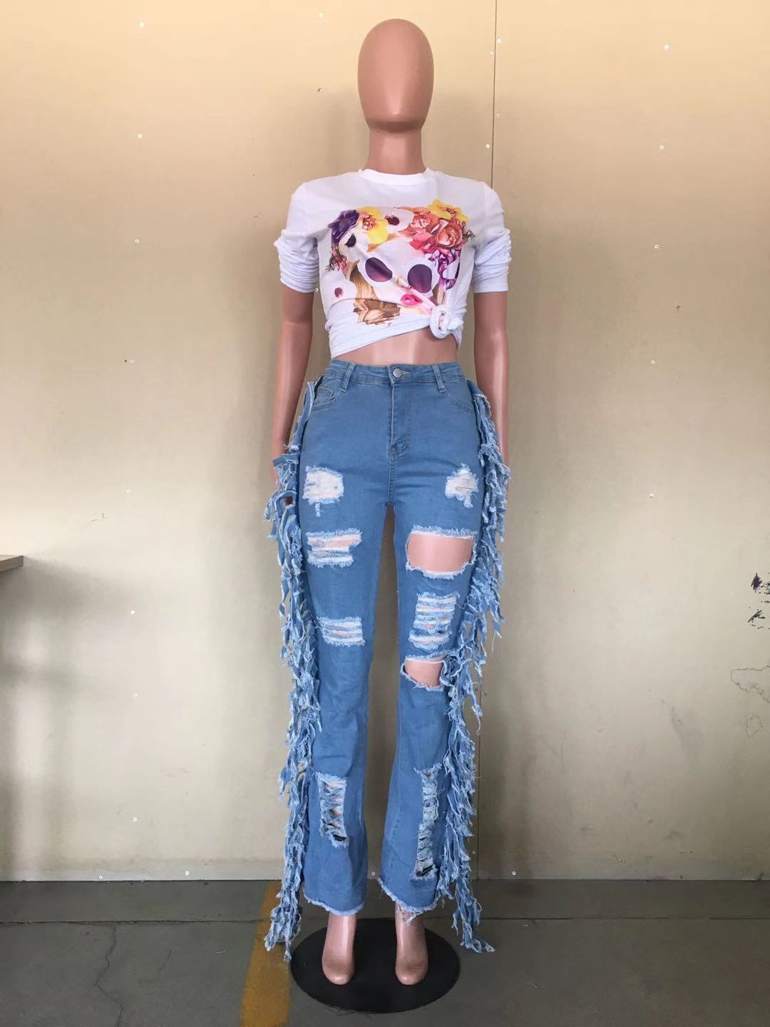 Calças Jeans rasgadas - O Retalho