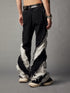 Calça Jeans Skinny em Patchwork Preto e Branco com Acabamento Desfiado - O Retalho