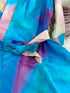 Vestido estampado com mangas compridas e decote em V. - O Retalho