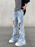 Jeans Azul rasgados - O Retalho