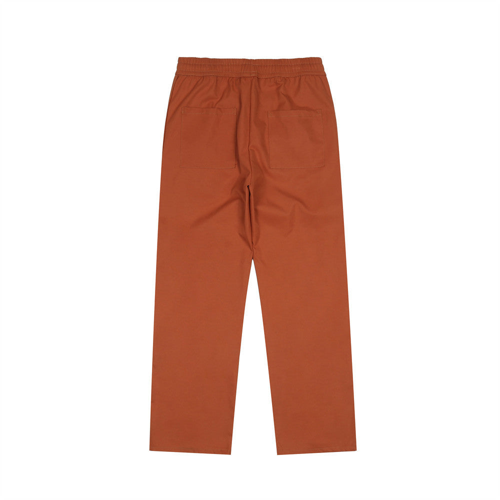 Calças Soltas com Cintura Elástica e Detalhes em Patchwork no Estilo Street Trend - O Retalho