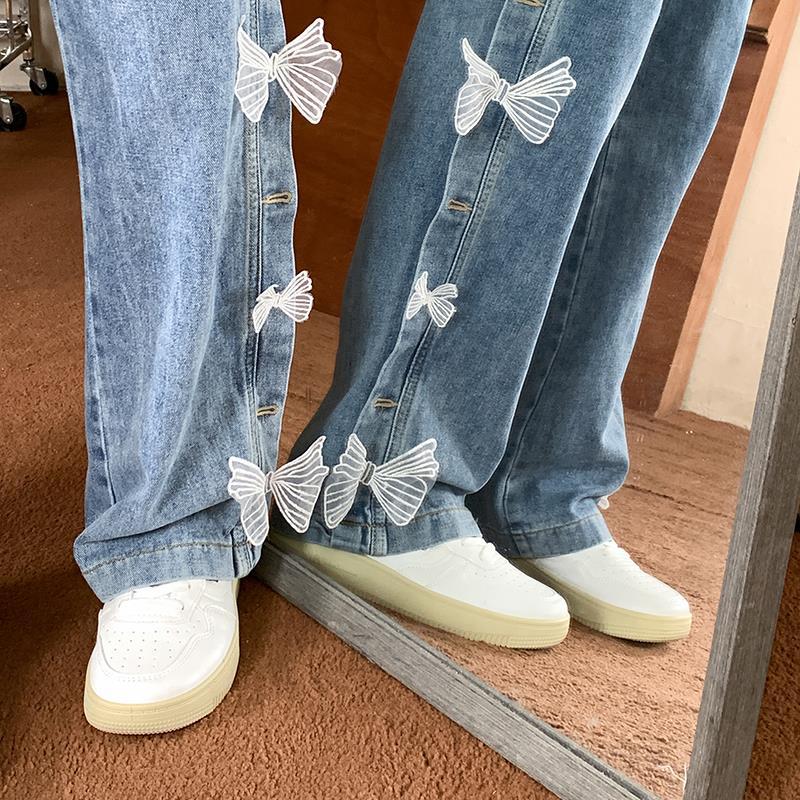 Calça Jeans Reta Solta com Laço na Cintura Alta - O Retalho